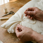 Workshop view of the hand-tufting process at the New Jersey facility where Circadian duvets are made