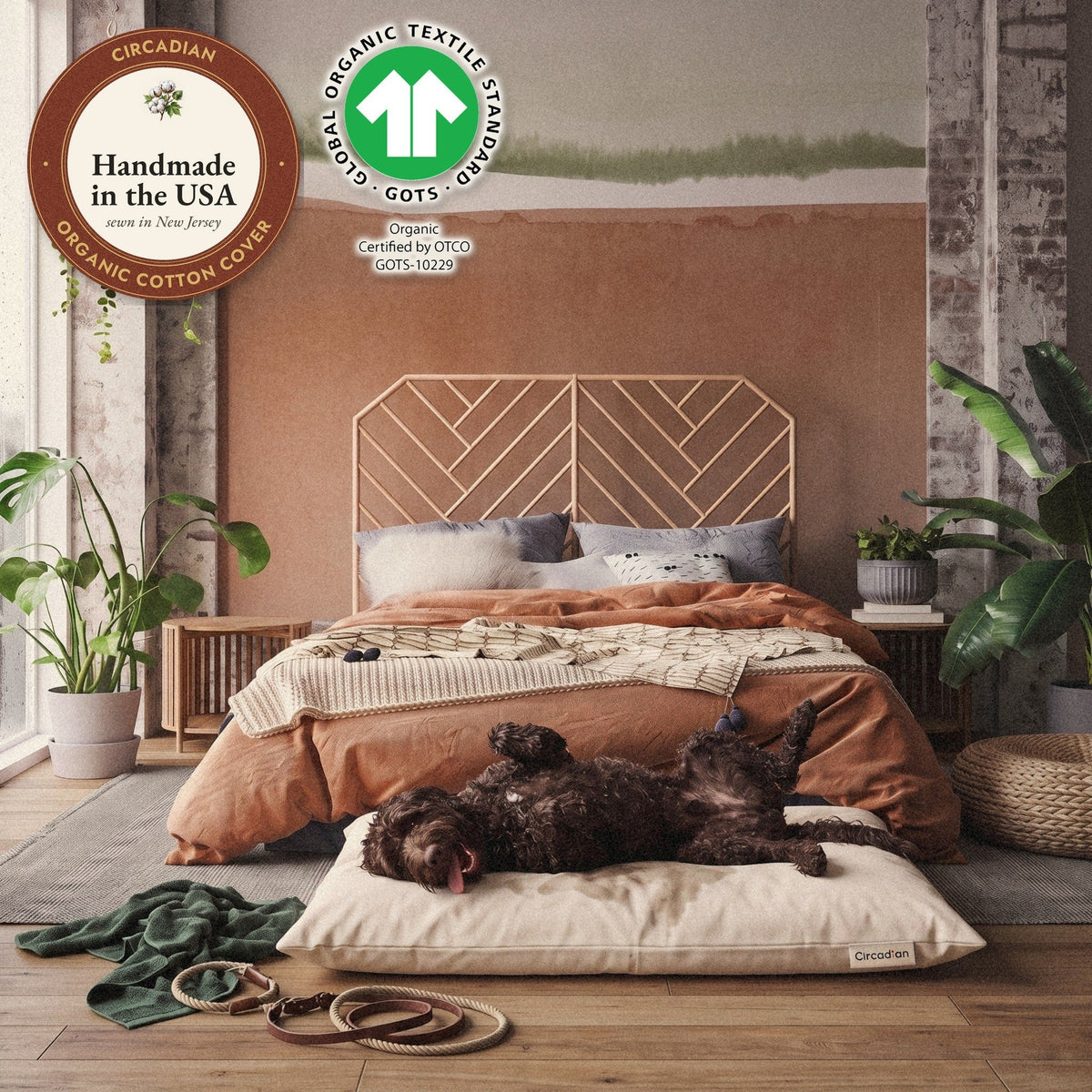 A damp labradoodle rolls on the waterproof dog bed cover. GOTS label (the Global Organic Textile Standard): GOTS-10229.