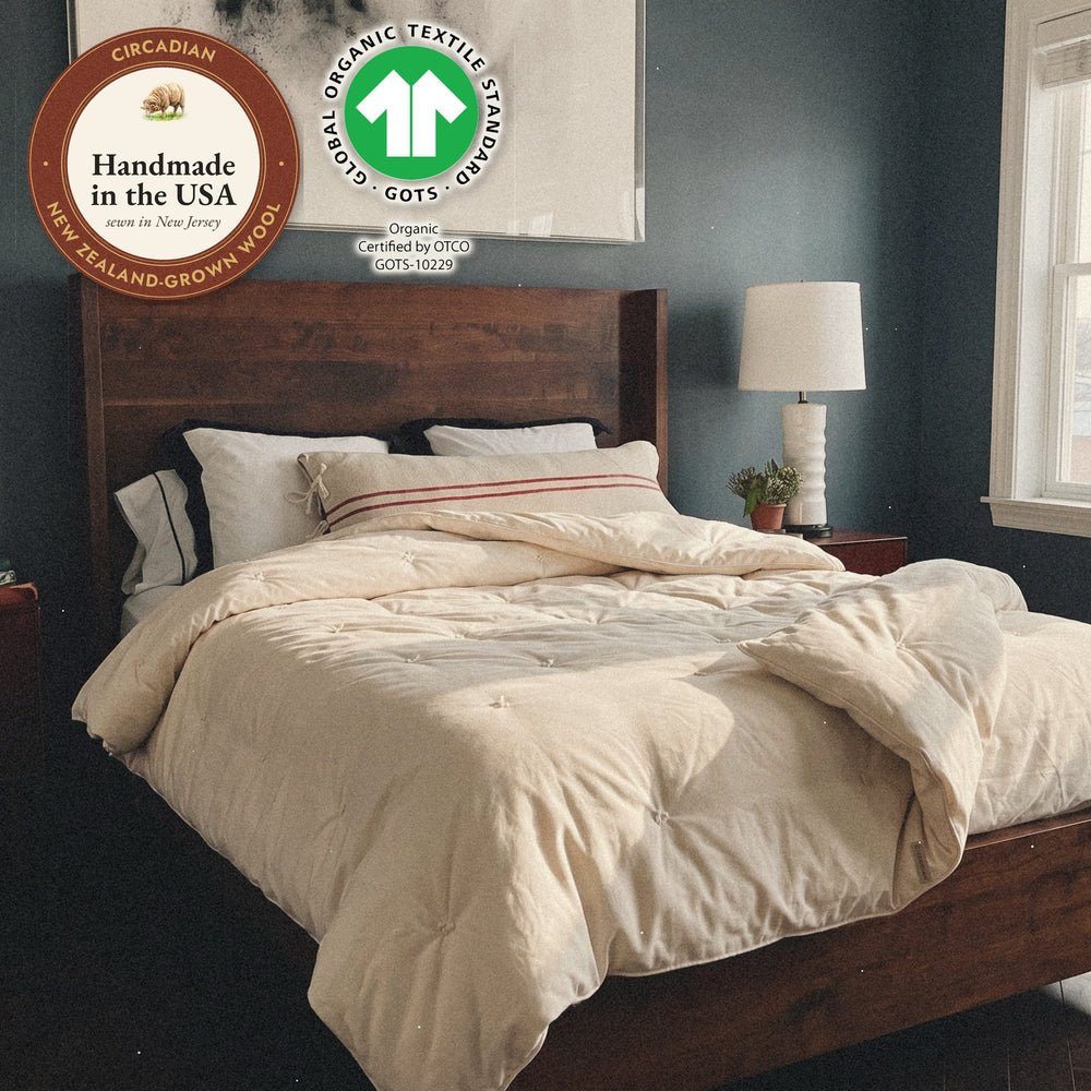 Circadian Organic Wool Comforter on a made bed